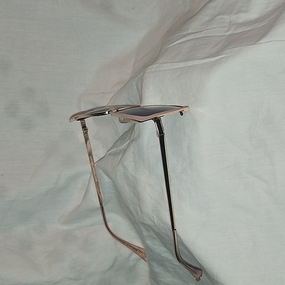 Stylish Pink and Black Sunglasses for a Bold Look - Picture 5 of 16